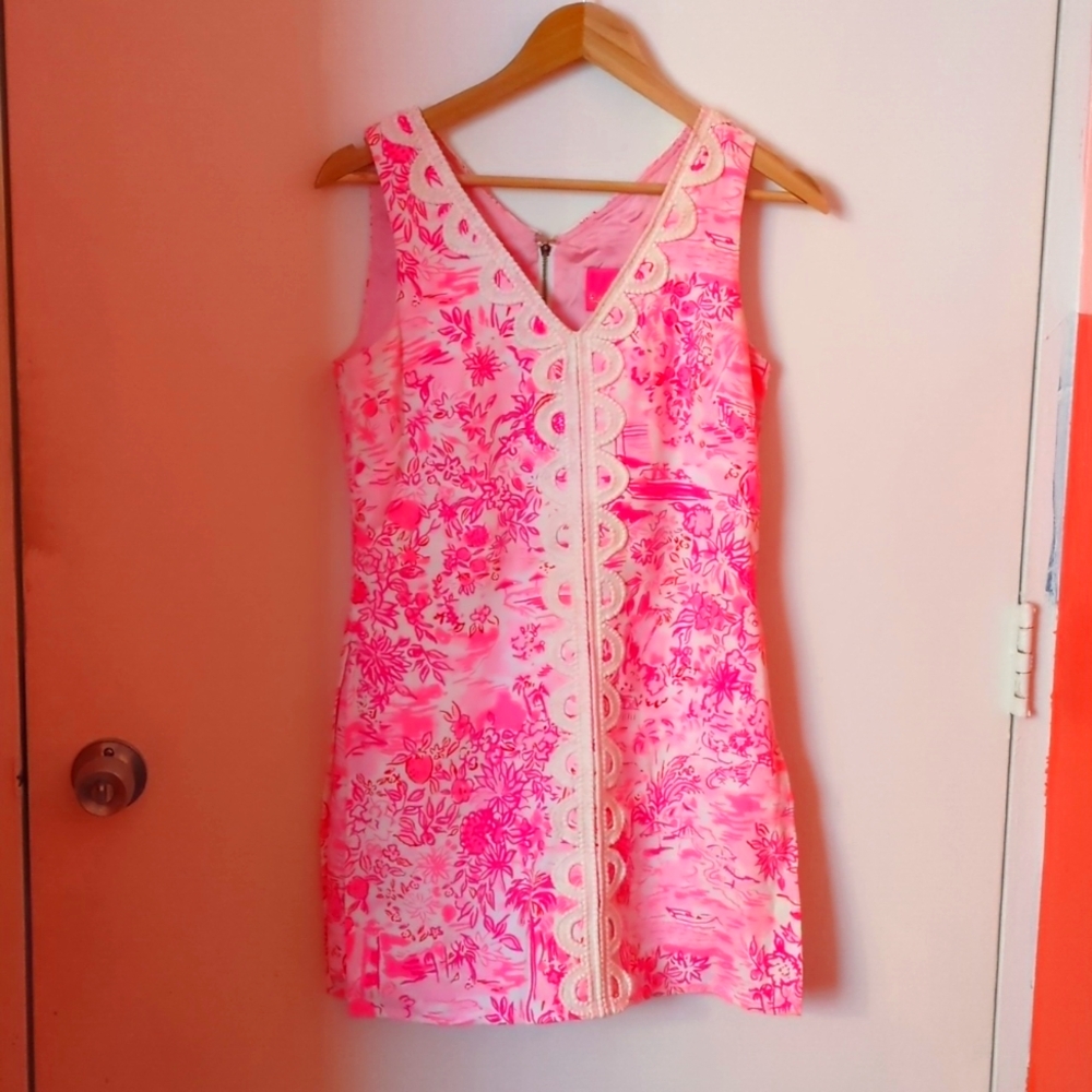 Hot pink with white lace floral mini jumper looks like dress.
